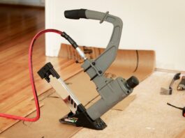 Eco-Friendly Flooring Ideas for Sustainable Living A room being renovated has the subfloor visible in one half and new bamboo hardwood installed on the other half.